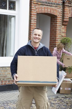 Moving van and packed boxes outside a Belsize Park flat