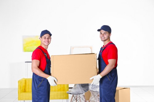 Removal van and moving boxes for a house move in Belsize Park