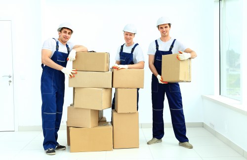 Removal van and moving crew handling access challenges in Belsize Park