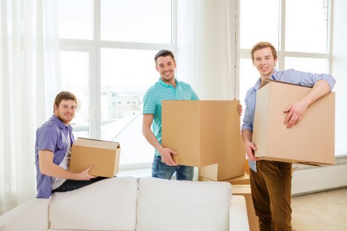 Professional movers handling fragile items in Belsize Park